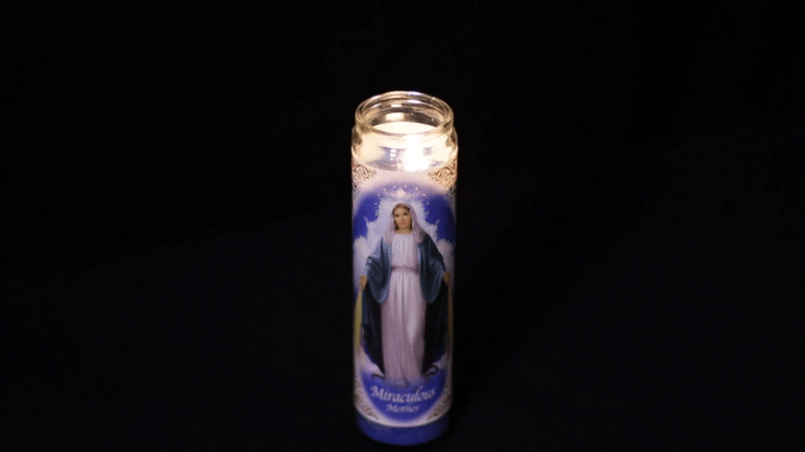 Miraculous Mother Candle burning